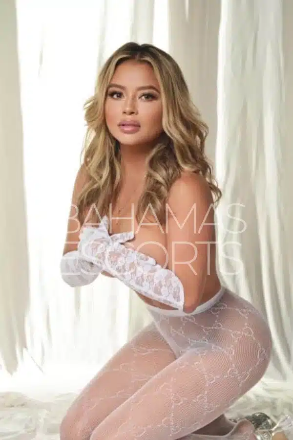 beautiful Colombian companion with blonde hair and a captivating, seductive expression