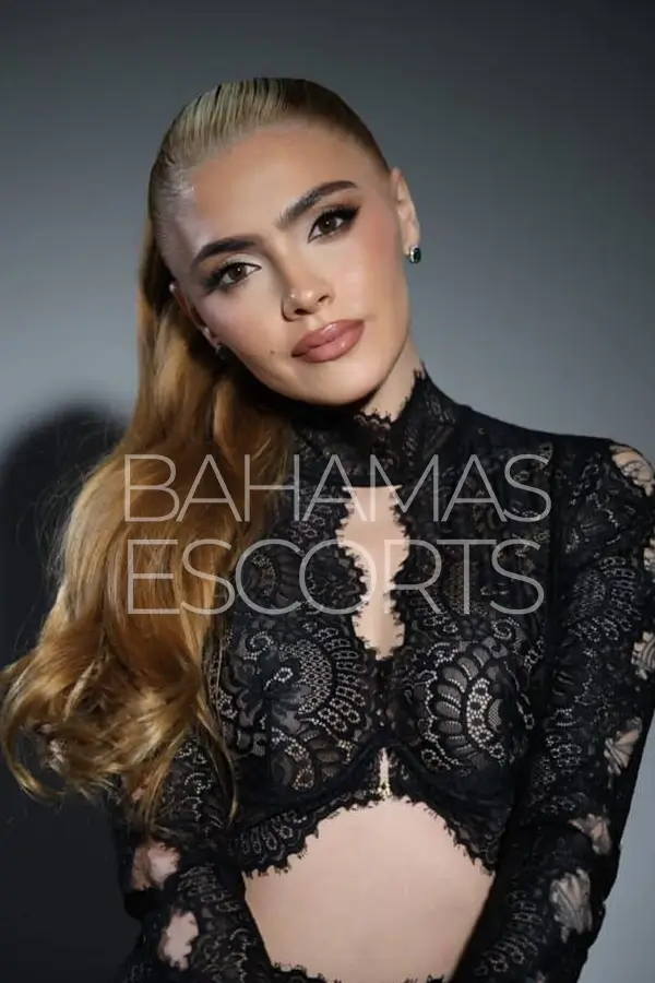 beautiful Colombian companion with blonde hair, brown eyes, and a captivating seductive expression