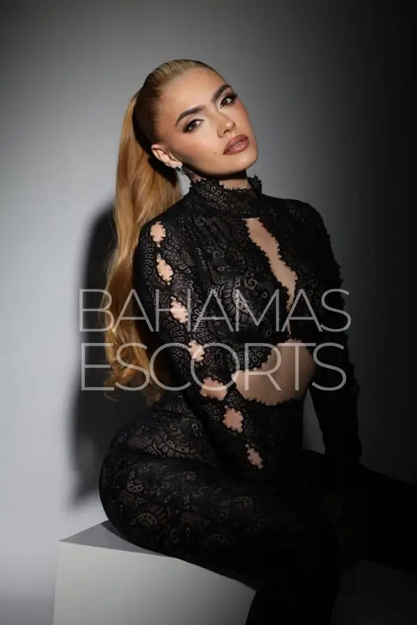 beautiful Colombian companion with blonde hair, brown eyes, and a captivating seductive expression